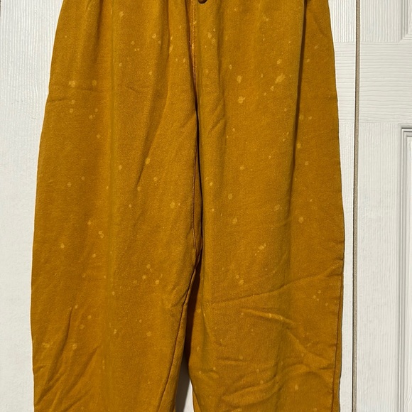 Mustard Urban Outfitters Puffy Pants with light bleach spots. - Picture 3 of 9